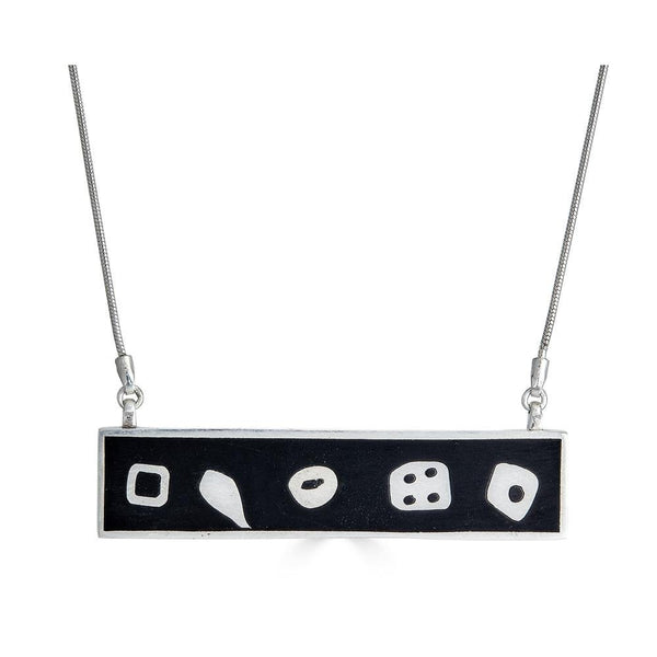 Abstract No.9 Necklace Ronnie Taubenfeld  is a silver horizontal bar pendant with organic silver shapes on a black resin background