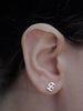 Ia Studs Earrings Ronnie Taubenfeld shown on a woman's ear