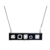 Abstract No.3 Necklace Ronnie Taubenfeld is a silver horizontal bar pendant with square Murano glass slices and silver squares on a black resin background