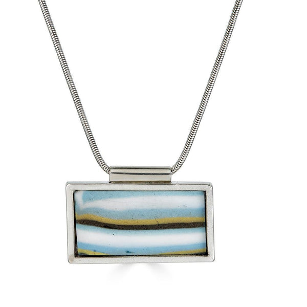 Arafel Pendants Ronnie Taubenfeld is a handmade collaboration with a porcelain tile set in a silver frame