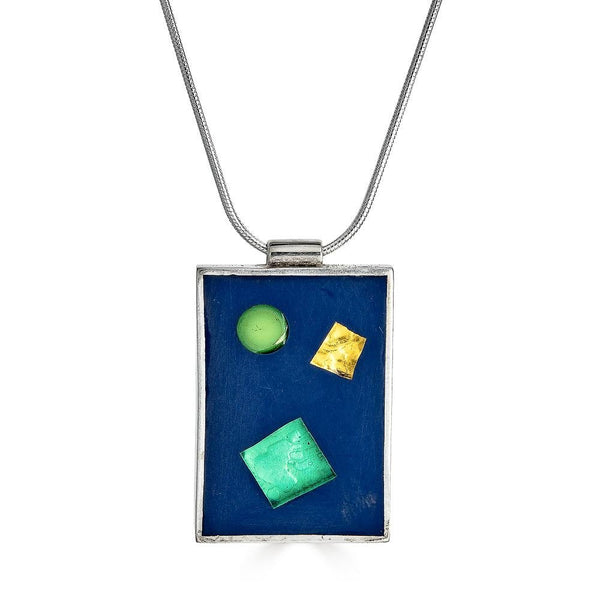 Barcelona Necklace Ronnie Taubenfeld is a handmade rectangular sterling silver pendant with Murano glass shapes of green and gold set in black resin