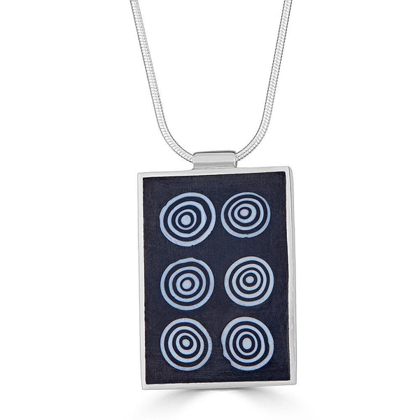 Bullseye Mania Necklaces Ronnie Taubenfeld is handmade using six Murano glass bullseye slices in a dark resin background set in sterling silver