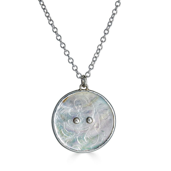 Cosmos Necklaces Ronnie Taubenfeld is handmade from an etched mother of pearl limited edition button set in sterling silver
