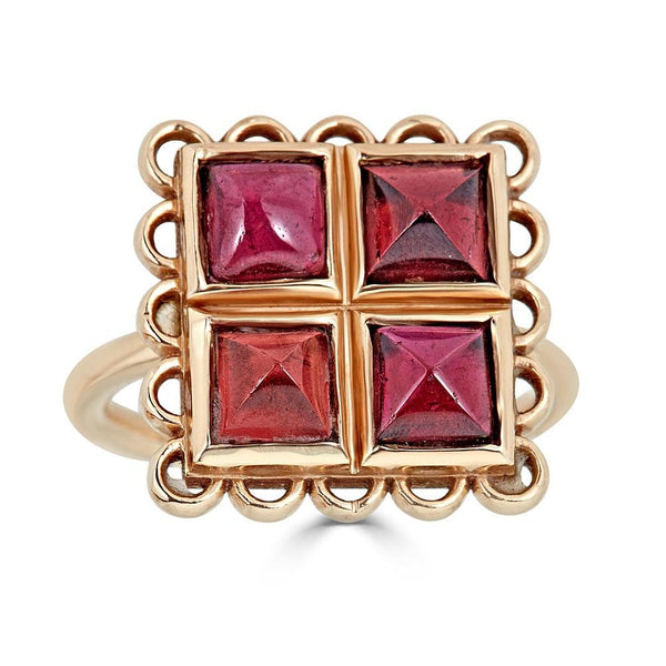 Foursquare Ring Ronnie Taubenfeld four pyramid cut garnet gems are hand set in a 14k gold lacy frame