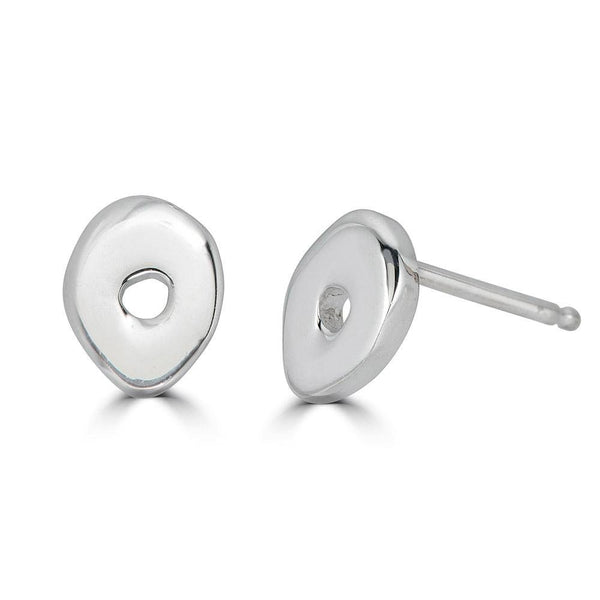 Gaua Studs Earrings Ronnie Taubenfeld are handmade tiny sterling silver ovals with a hole in the center of each