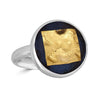 Gold Rush Ring by Ronnie Taubenfeld is a handmade sterling silver round setting framing a 24k yellow gold-fused Murano glass square embedded in black resin.