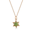 Gossamer Star Necklace Ronnie Taubenfeld is a delicate 14K yellow gold star-shaped setting with open back and milgrain details, with a green Tourmaline star-cut gem inside, hanging from a 14k gold cable chain. Handmade.