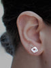 Lolo Stud Earrings Ronnie Taubenfeld shown on a woman's ear.