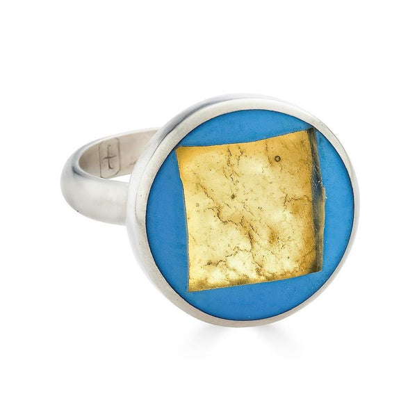 Rush of Gold Ring Ronnie Taubenfeld  is a handmade sterling silver round setting framing a 24k yellow gold-fused Murano glass square embedded in robin's egg blue resin.