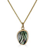 Safari Tourmaline Necklace by Ronnie Taubenfeld is a striped green Tourmaline gem set hand set in 14K yellow gold suspended from a gold cable chain.