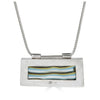 Shalva Pendant by Ronnie Taubenfeld reverse side showing window which lets you see the striped tile from the back.