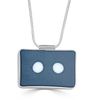 Side by Side Necklace by Ronnie Taubenfeld is a silver rectangle with two white glass dots embedded in gray resin set inside, and hangs from a silver snake chain.