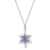 Silver Ethereal Star Necklace by Ronnie is a silver 6 pointed star set with a star cut blue Iolite gem and hanging from a silver cable chain.