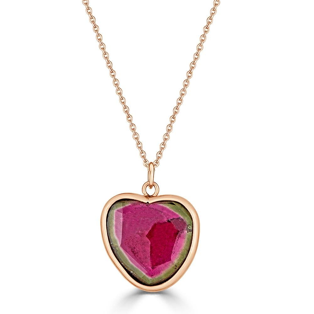 Watermelon Lover Necklaces Ronnie Taubenfeld is a heart shaped slice of pink and green Watermelon Tourmaline set in 14K gold and hanging  from a gold cable chain.