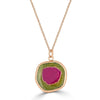 Watermelon Slice Gem Necklace by Ronnie Taubenfeld is a slice of pink and green Watermelon Tourmaline set in 14K gold and hanging from a gold cable chain.