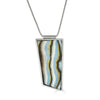 Zorem Pendant by Ronnie Taubenfeld is a handmade striped porcelain tile set in sterling silver, hanging from a silver snake chain.